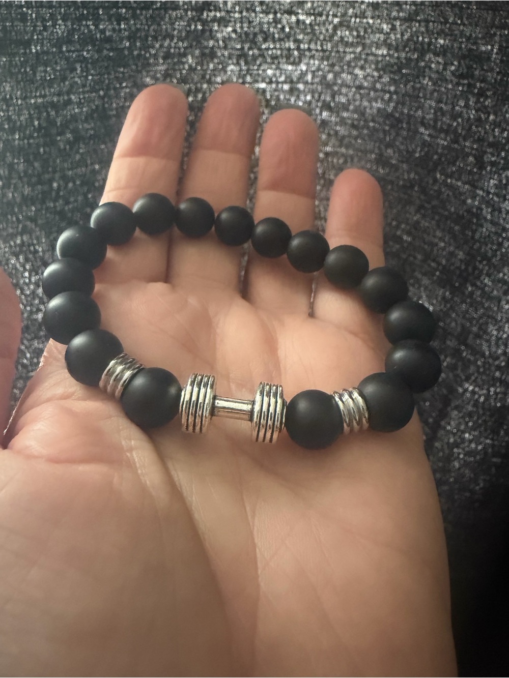 The “Ironbound” Bracelet. Black Onyx and Stainless Steel Weight on Elastic Cord.
